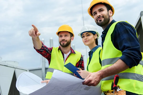 All States Mechanical engineers reviewing plans on site